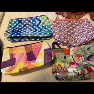 Assorted Clinique giveaway zipper bags